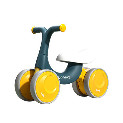 オレンジプラスチックベビーウォーカー バランスカー サイレントローラースケートとグリーンデザイン