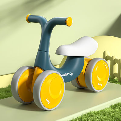 オレンジプラスチックベビーウォーカー バランスカー サイレントローラースケートとグリーンデザイン