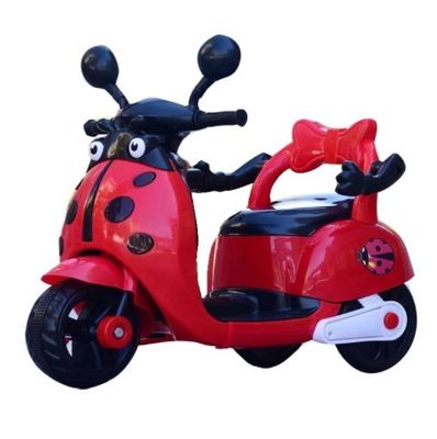 プラスチック 電動 モーターサイクル 子供 は 光 と 音楽 を 放っ て 玩具 に 乗っ て いる